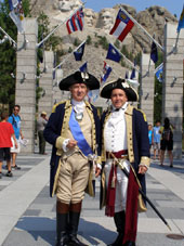 Gene Pisasale at Mount Rushmore with General Washington (portrayed by Carl Closs)